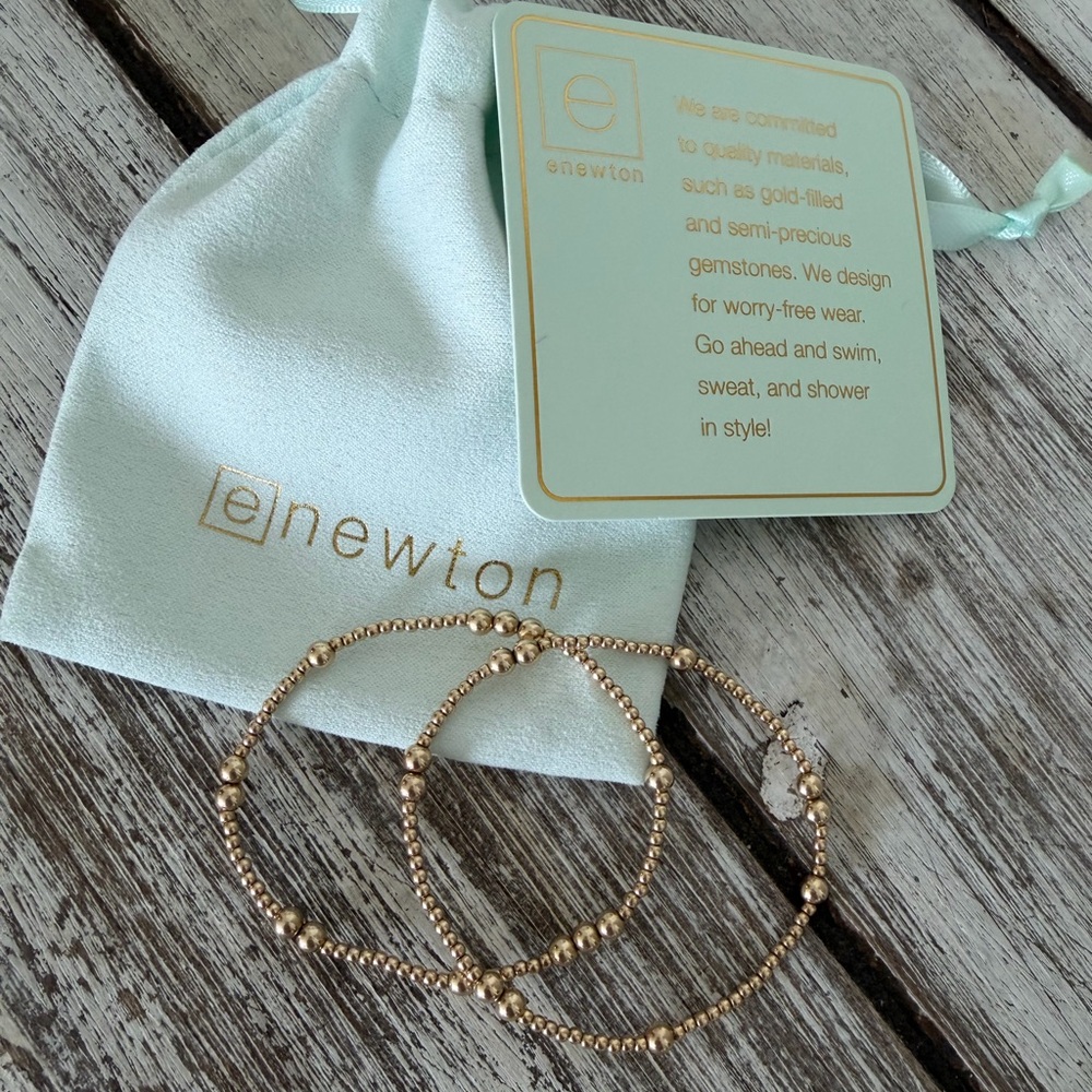 enewton bracelets in gold